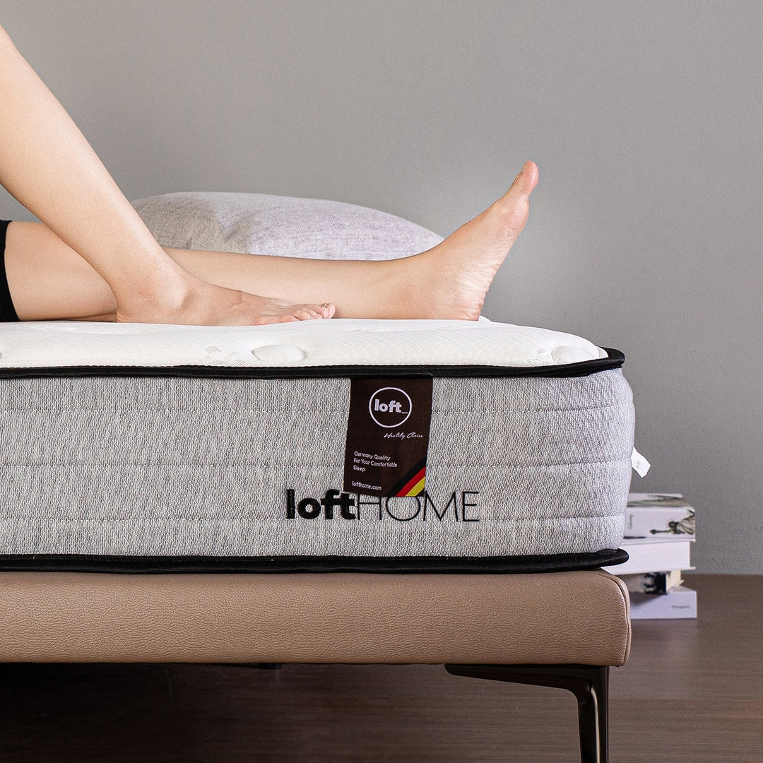 LoftHome SG single mattress with premium comfort layers, ergonomic support, and sleek branding, ideal for compact living spaces.