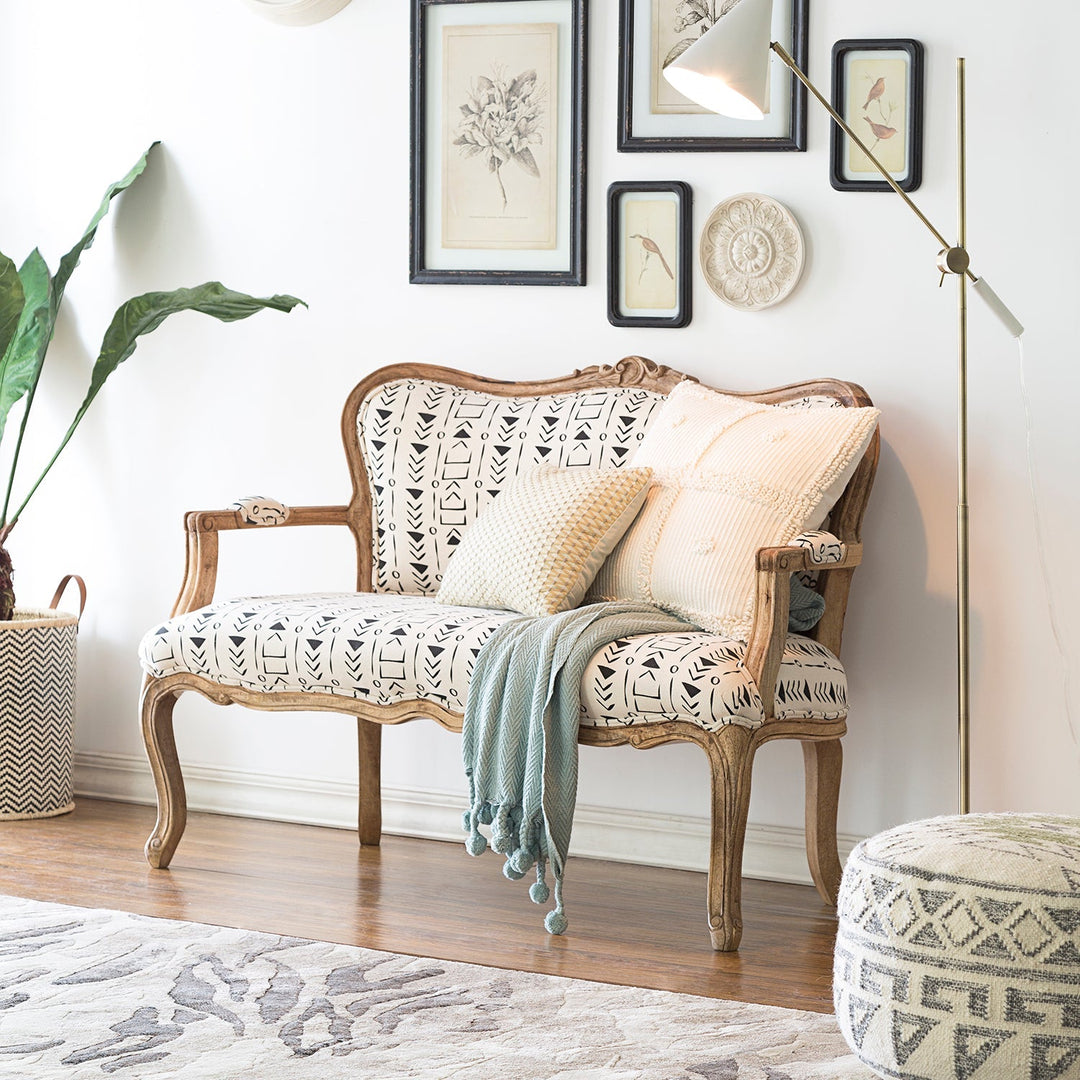 Loft Home Best Value Sofas Collection - Elegant two-seater upholstered in a patterned fabric with rustic wooden frame, perfect for cozy and affordable living room setups.