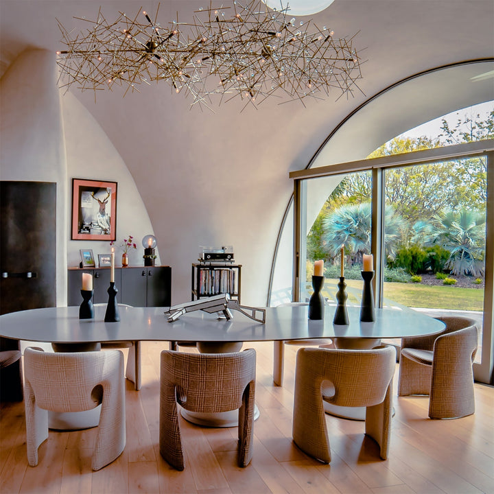 LoftHome contemporary chairs featuring sleek fabric designs and curved silhouettes, perfectly complementing modern dining spaces and artistic interiors.