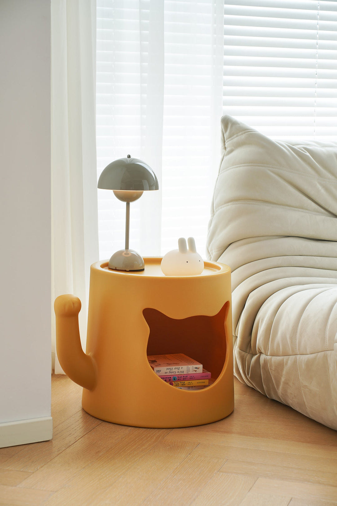 Pet-friendly orange side table with cat-inspired storage design, styled for US apartments, bedrooms, and cozy living rooms.