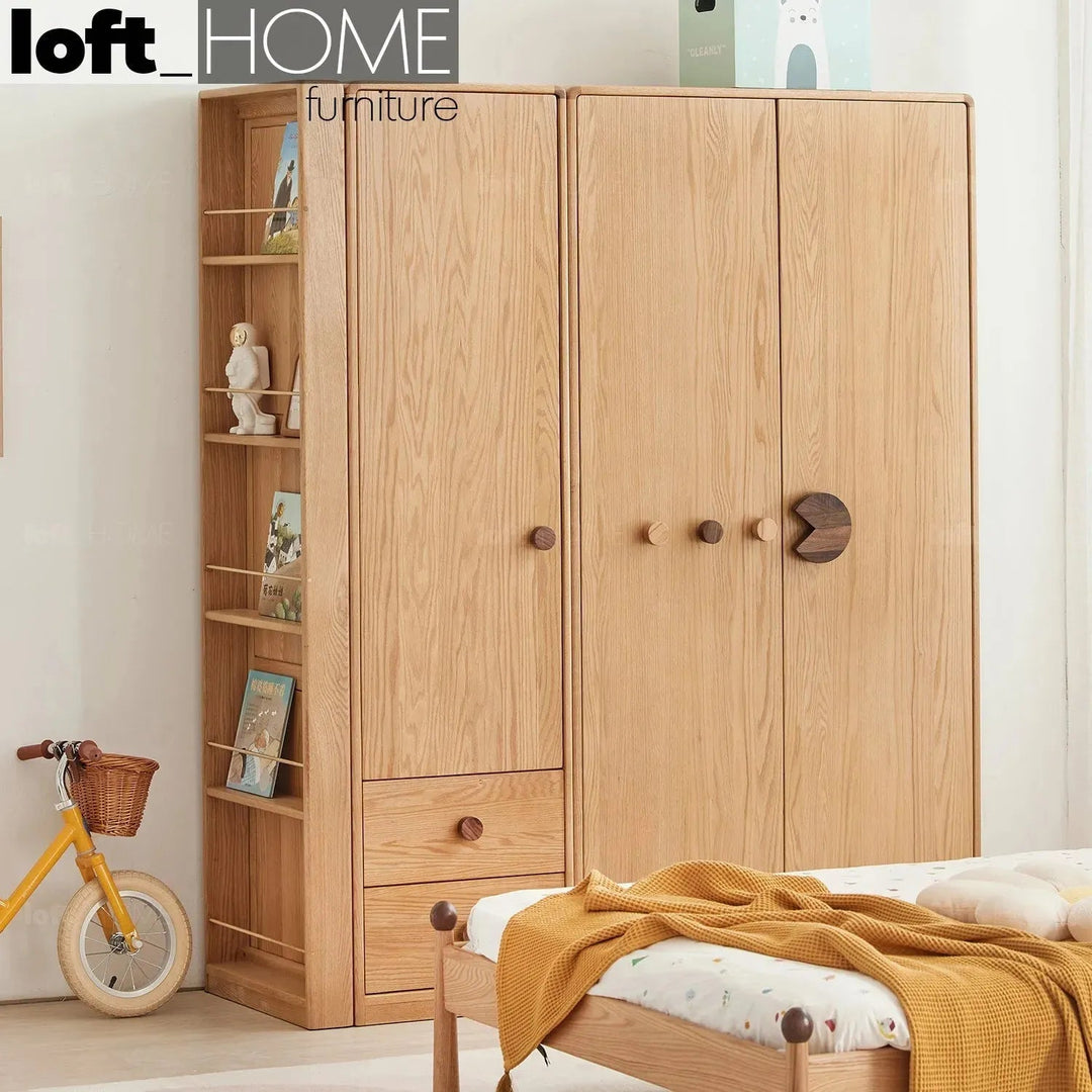 Scandinavian wood kids wardrobe pacman primary product view.