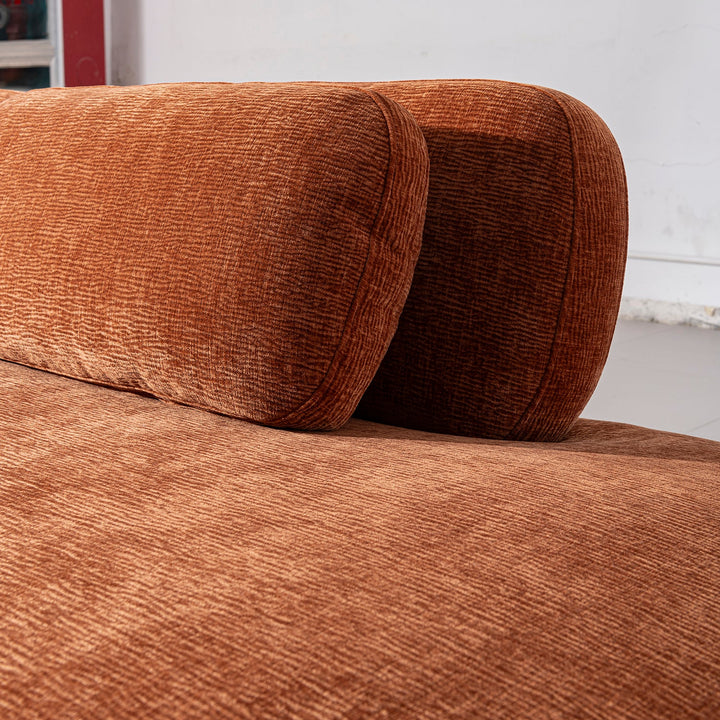 Cream velvet fabric modular chaise 2 seater sofa bubba in panoramic view.