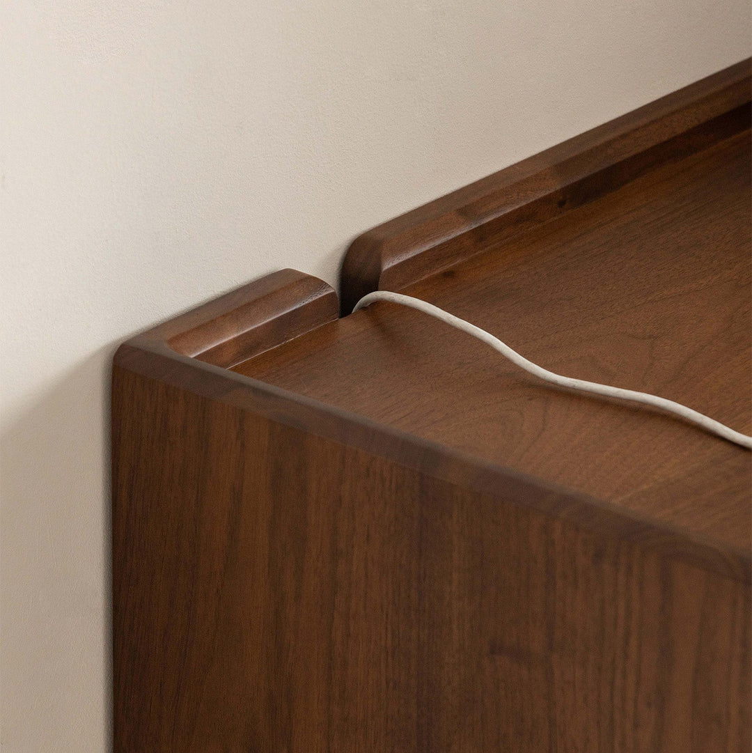 Vintage walnut wood side cabinet vista environmental situation.