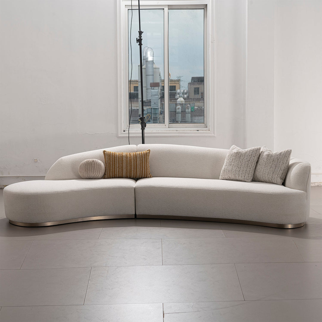 Modern boucle fabric modular l shape sectional sofa 3+l loomi in panoramic view.