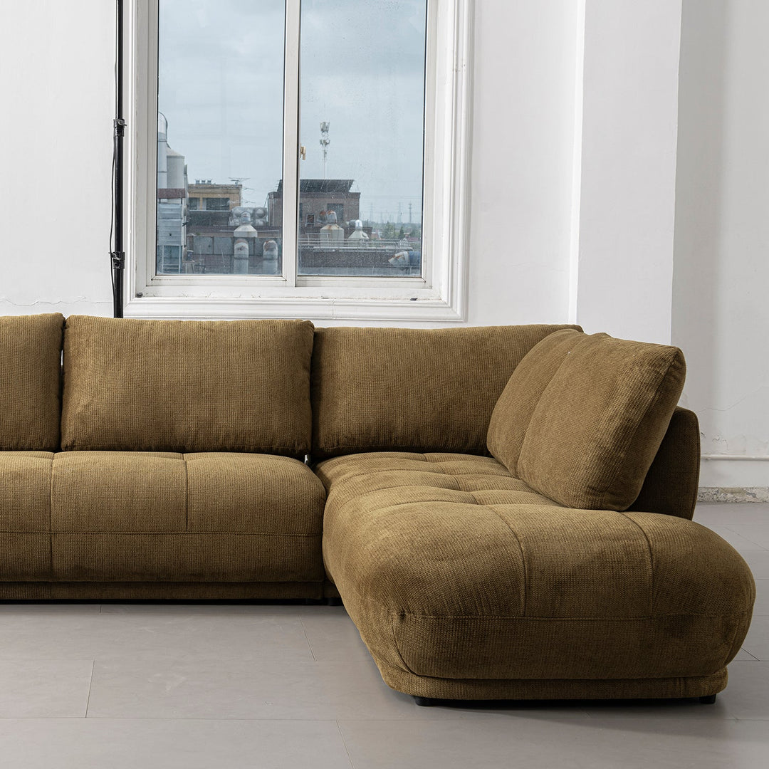 Cream cotton fabric modular l shape sectional sofa 3+l mossy in panoramic view.