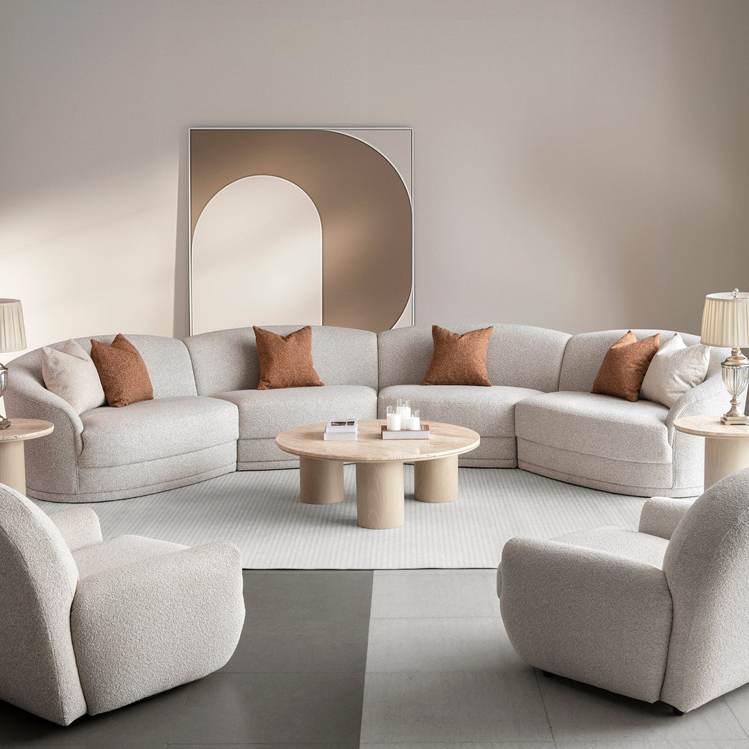 Modern boucle fabric modular sectional 4 seater sofa curva in panoramic view.