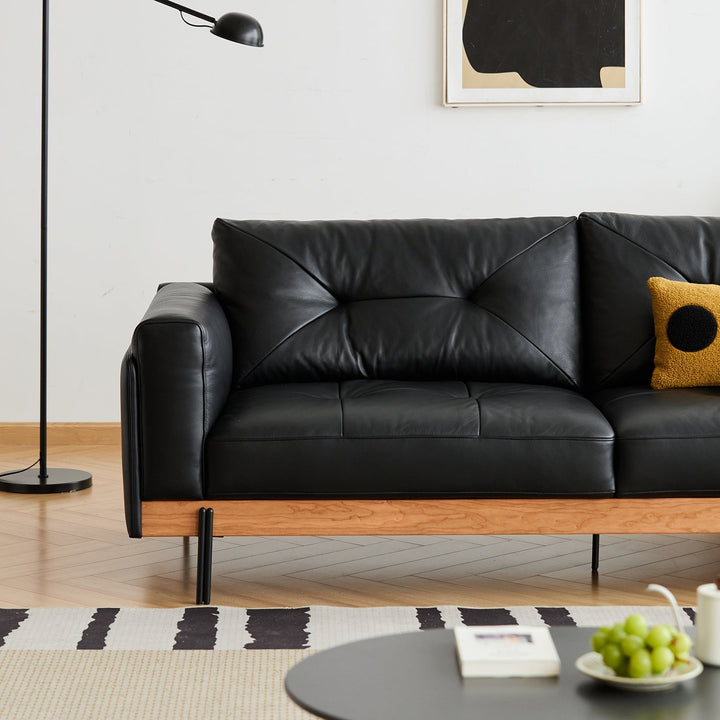 Bauhaus microfiber leather 3 seater sofa black in still life.