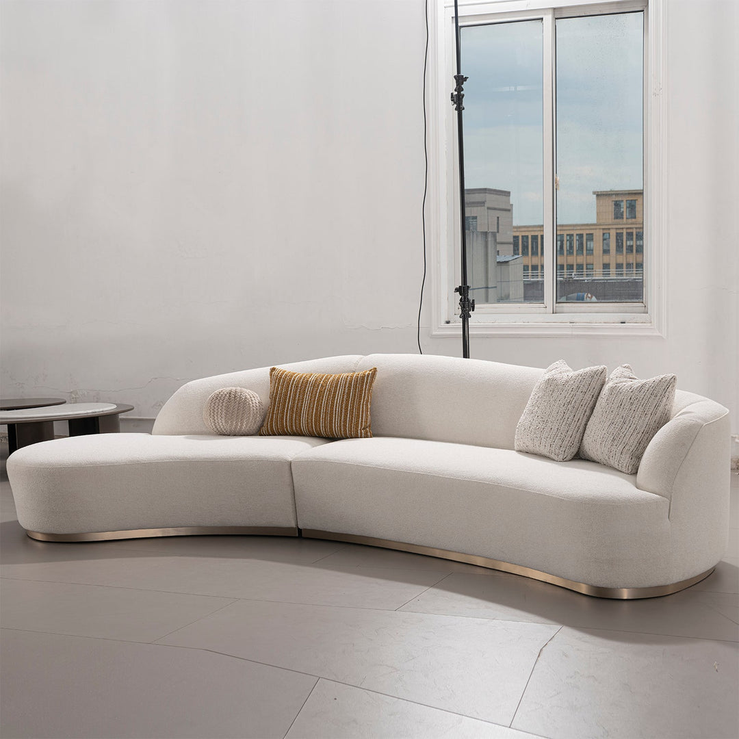 Modern boucle fabric modular l shape sectional sofa 3+l loomi in still life.