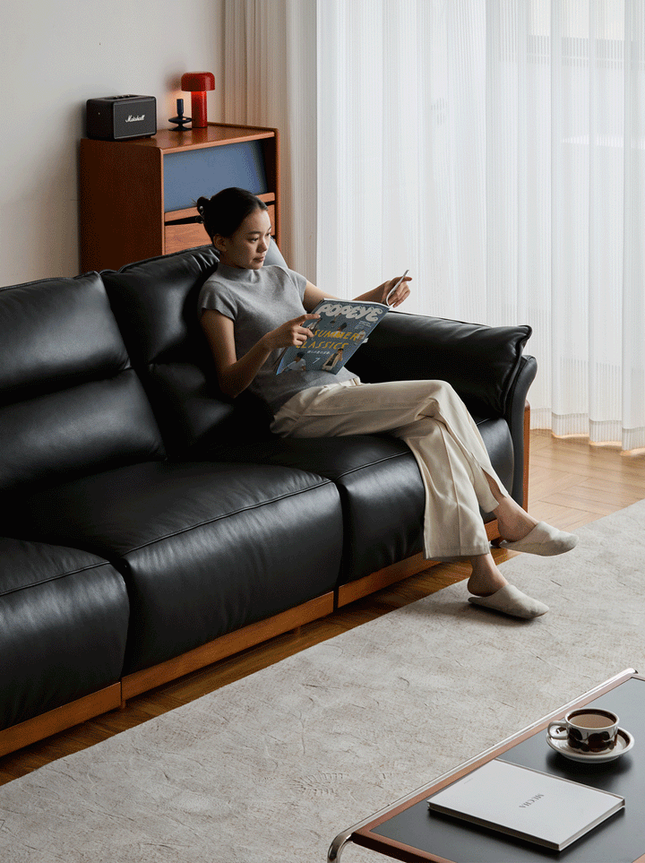 Vintage boxwood genuine leather electric recliner 4 seater sofa edgeless in close up details.