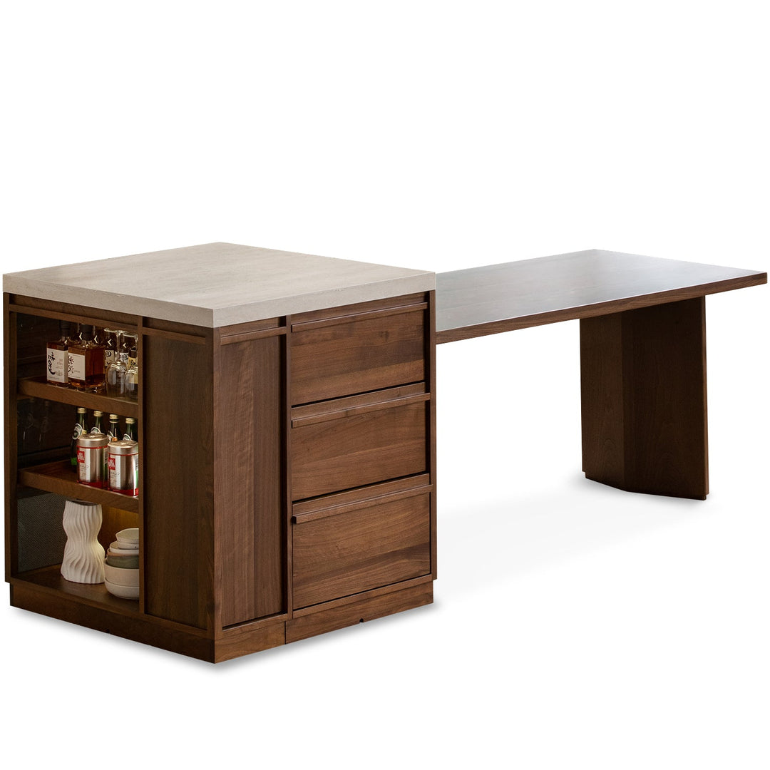 Japandi walnut wood sintered stone island dining table with cabinet axis in white background.