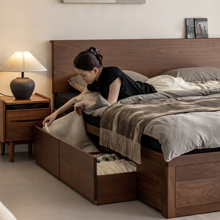 Vintage walnut wood lift-up storage bed with drawer kangaroo in still life.