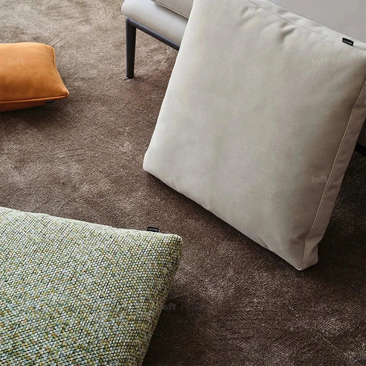Modern fabric sofa pillow summer green in details.