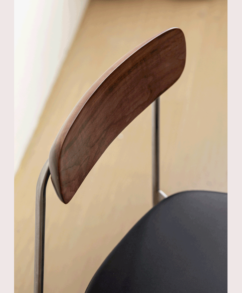 Bauhaus walnut wood dining chair wiener in real life style.