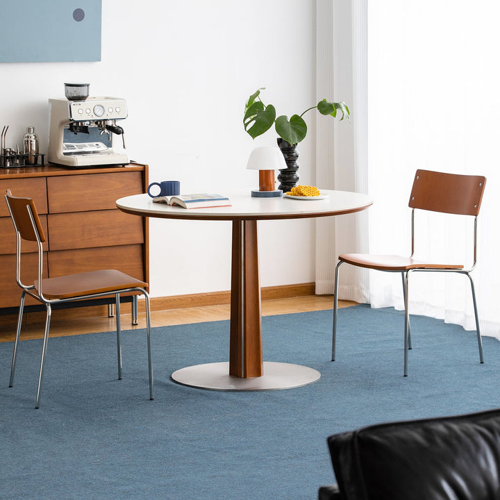 Bauhaus boxwood armless dining chair pinecone material variants.