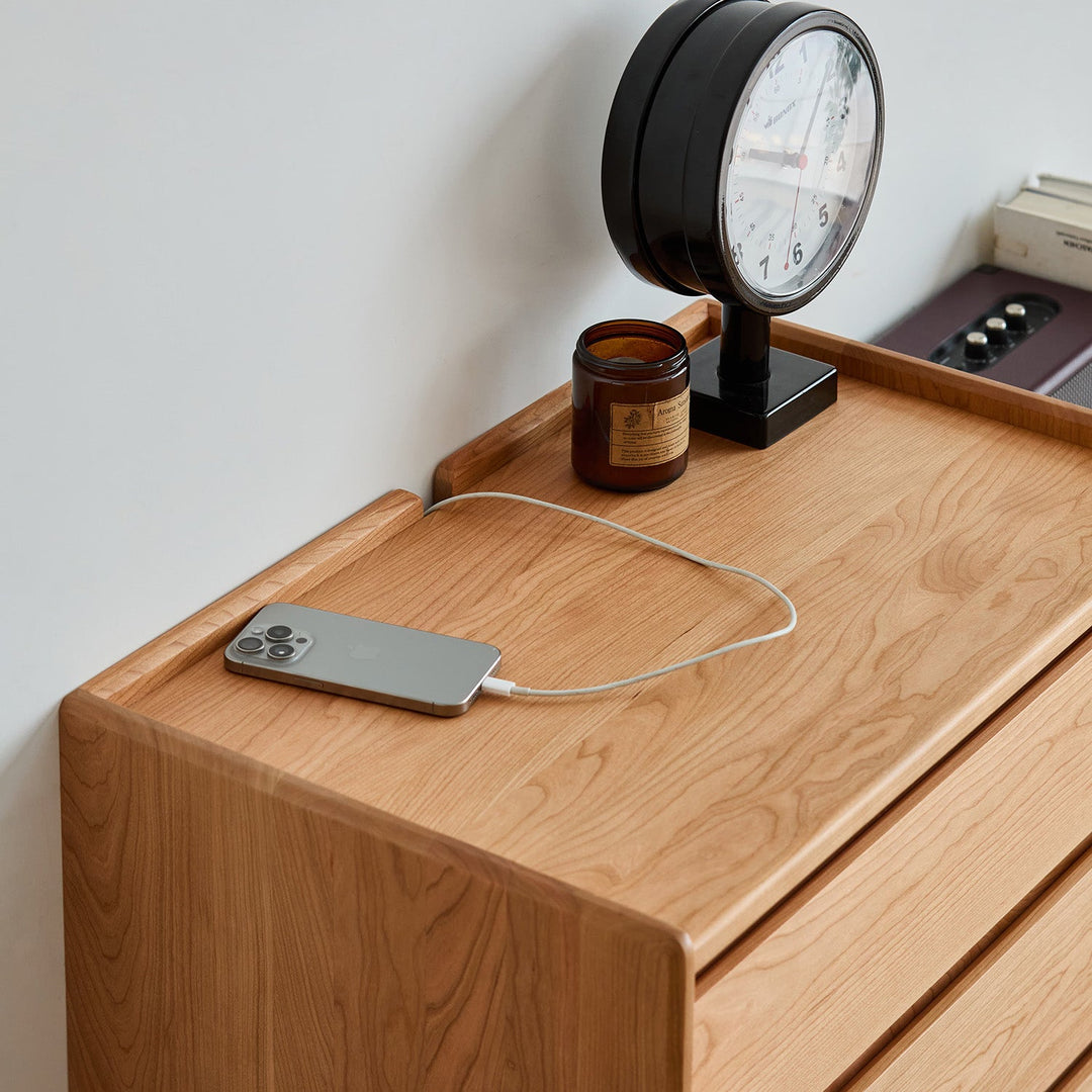 Scandinavian cherry wood chest of drawers vista with context.