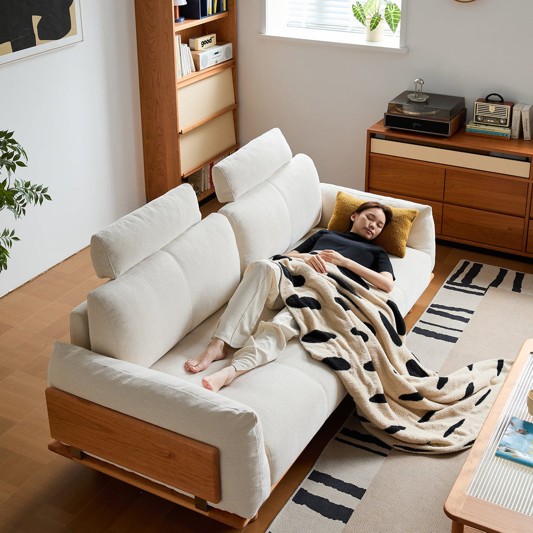 Scandinavian mixed weave fabric 3 seater sofa bessen with context.
