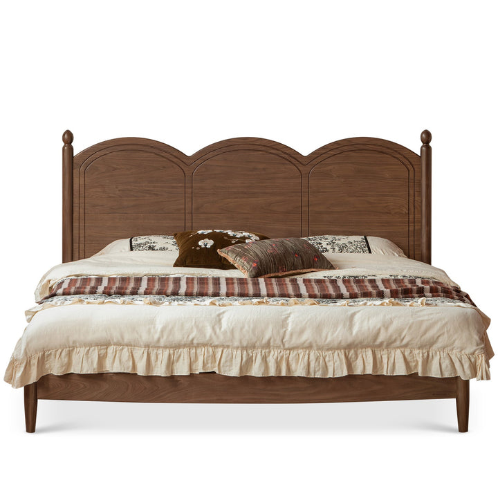 Vintage walnut wood bed midsummer in white background.
