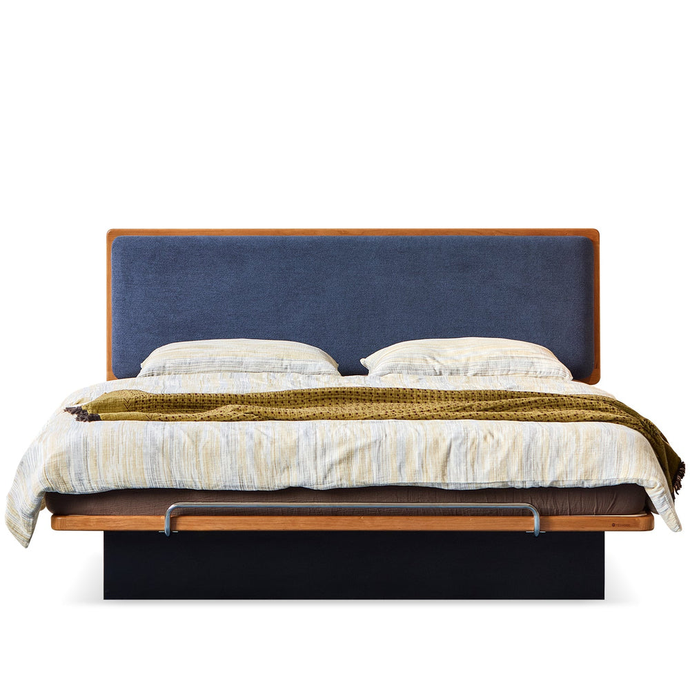 Bauhaus cherry wood storage bed film in white background.