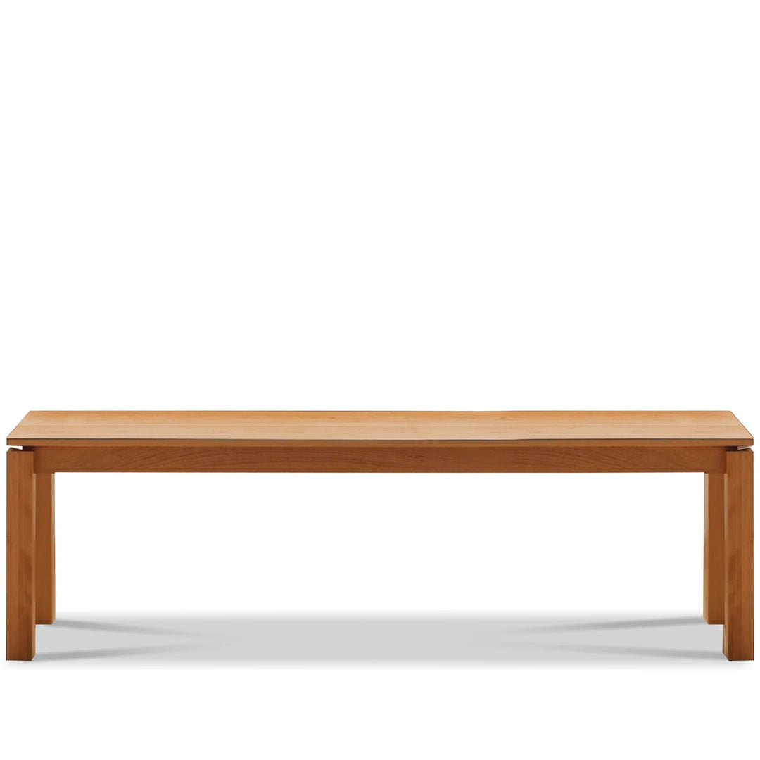 Minimalist cherry wood dining bench coastal in white background.