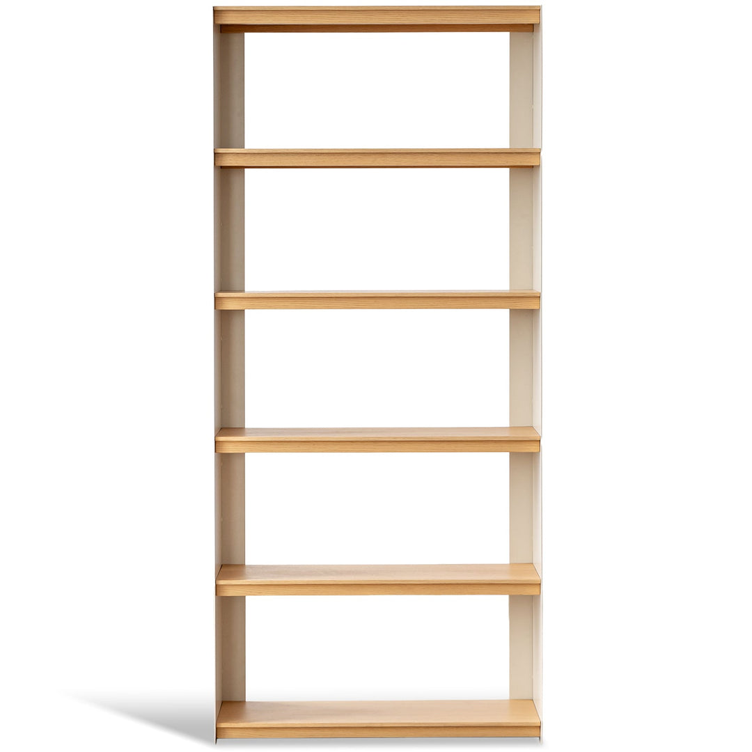 Minimalist stainless steel bookshelf aesop in white background.