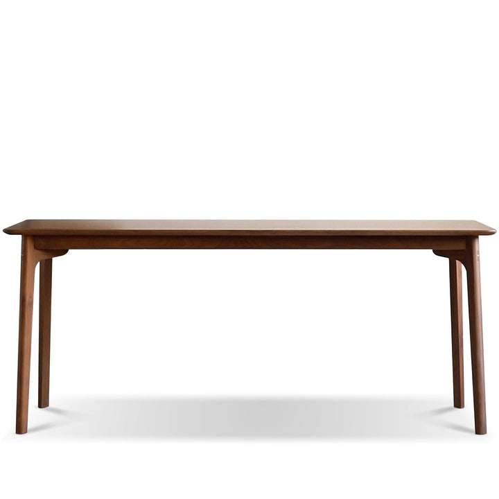 Vintage walnut wood dining table chrono in white background.