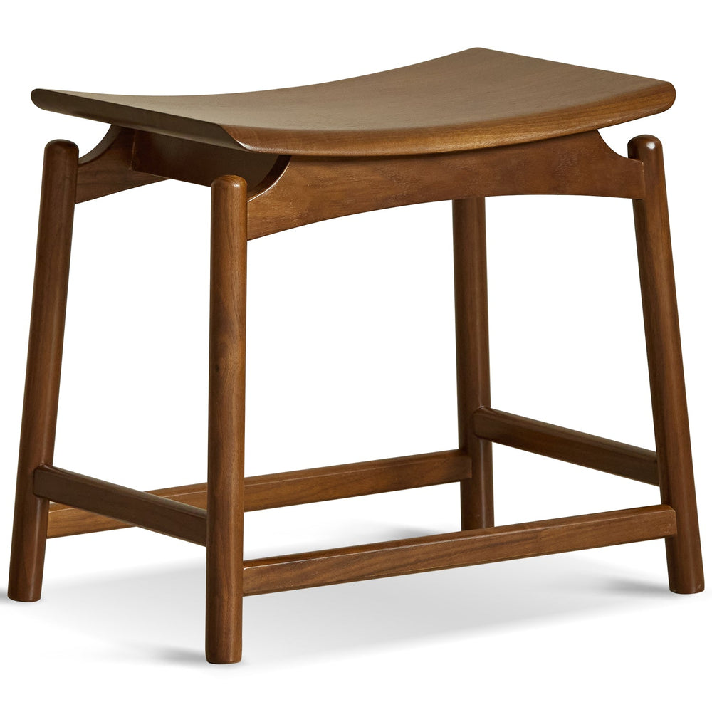 Vintage walnut wood stool arcus in white background.