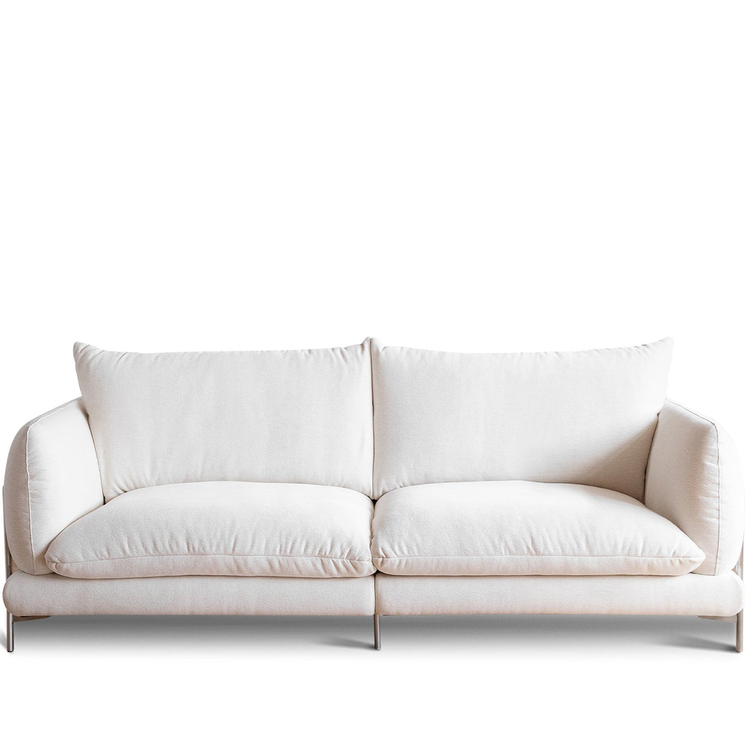 Minimalist cotton fabric 3 seater sofa como environmental situation.