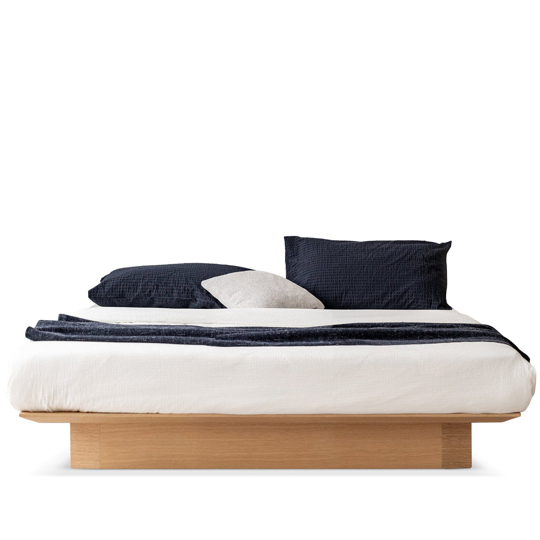 Minimalist ash wood veneer platform floating bed winter environmental situation.