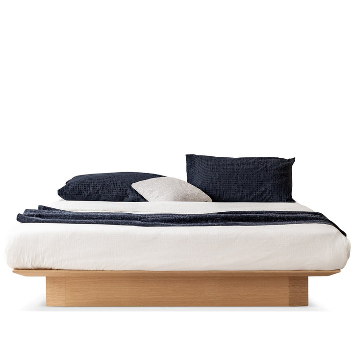 Minimalist ash wood veneer platform floating bed winter environmental situation.