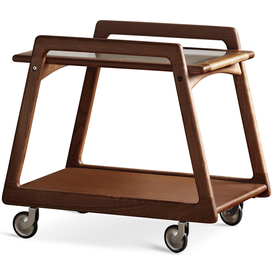 Vintage boxwood wheeled trolley side table yoyo in white background.