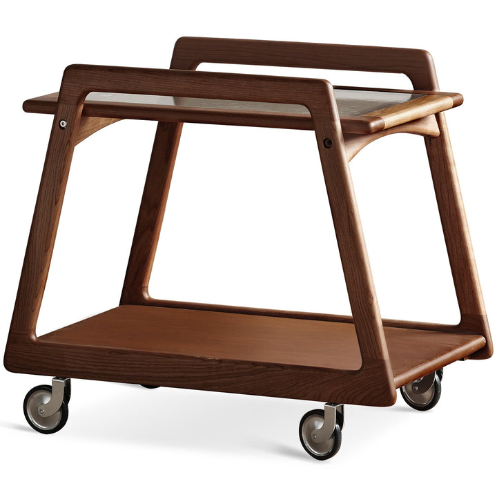 Vintage boxwood wheeled trolley side table yoyo in white background.