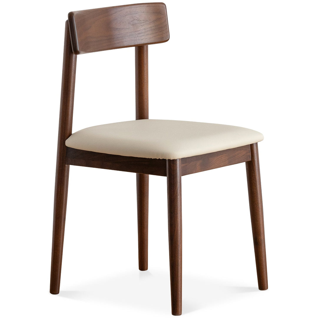 Japandi walnut wood microfiber leather dining chair green layered structure.