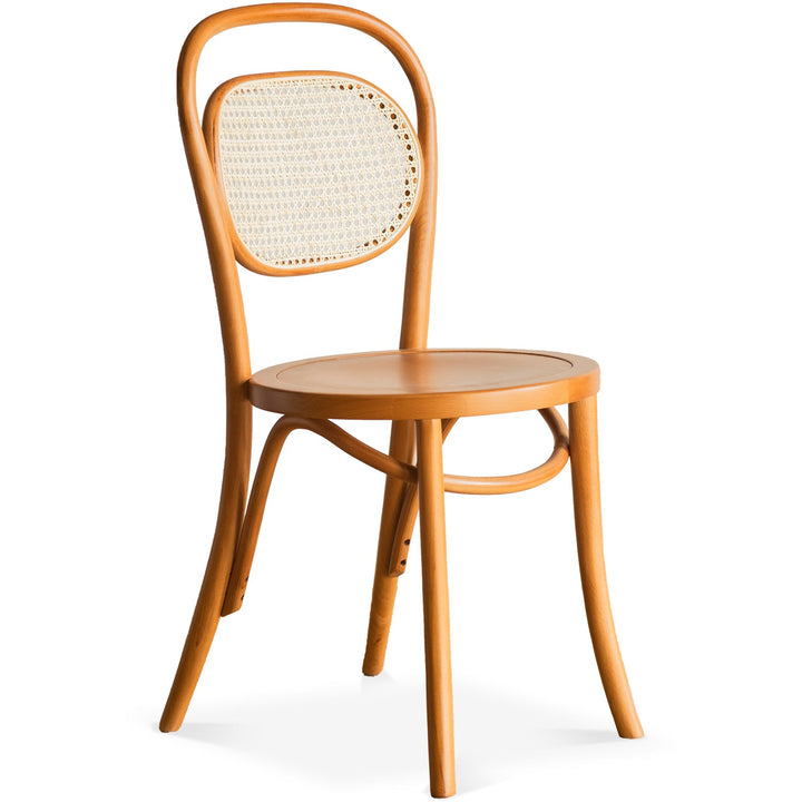 Scandinavian rattan dining chair german in white background.