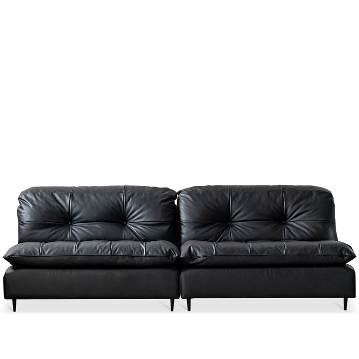 Vintage genuine leather 3 seater sofa riga in white background.