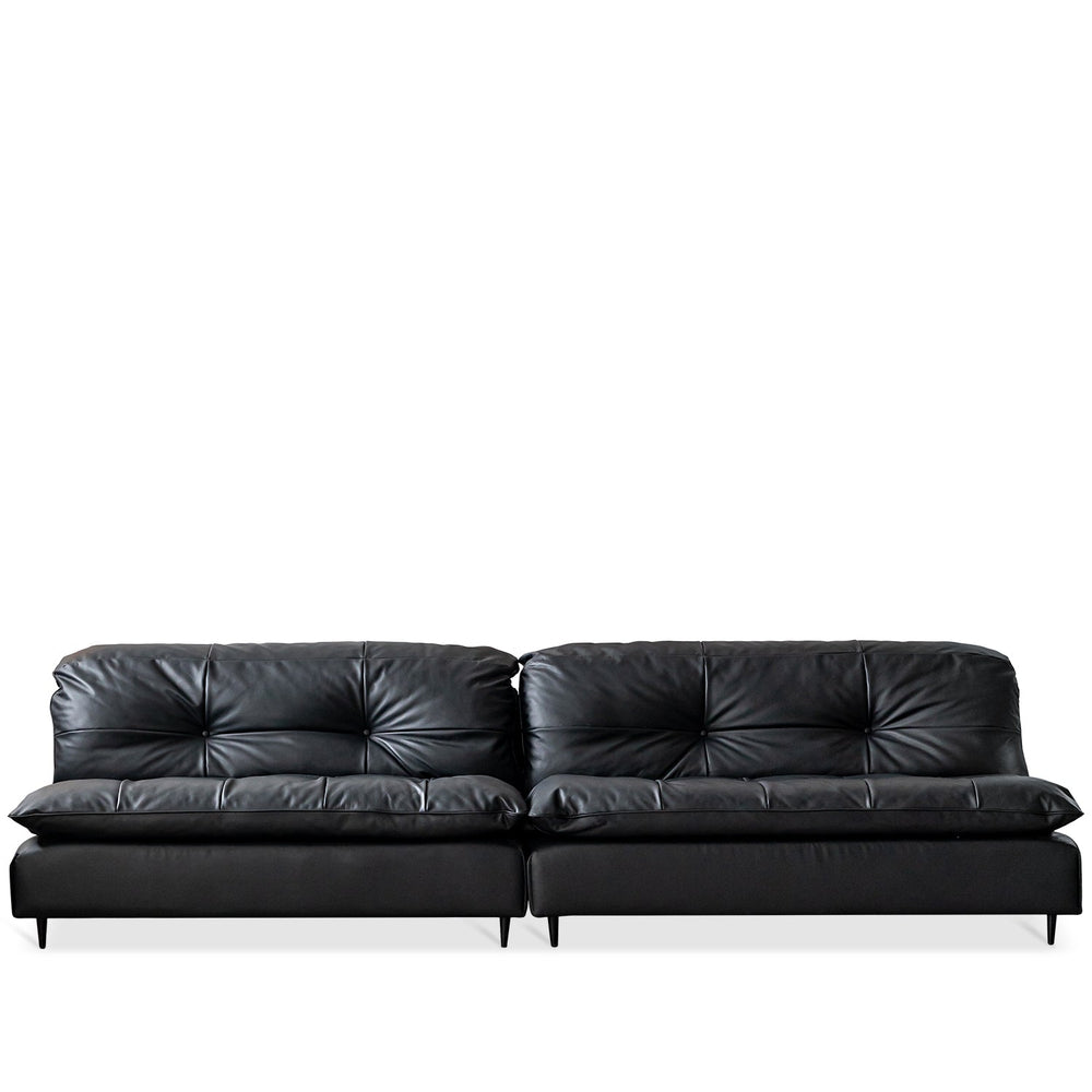 Vintage genuine leather 4 seater sofa riga in white background.