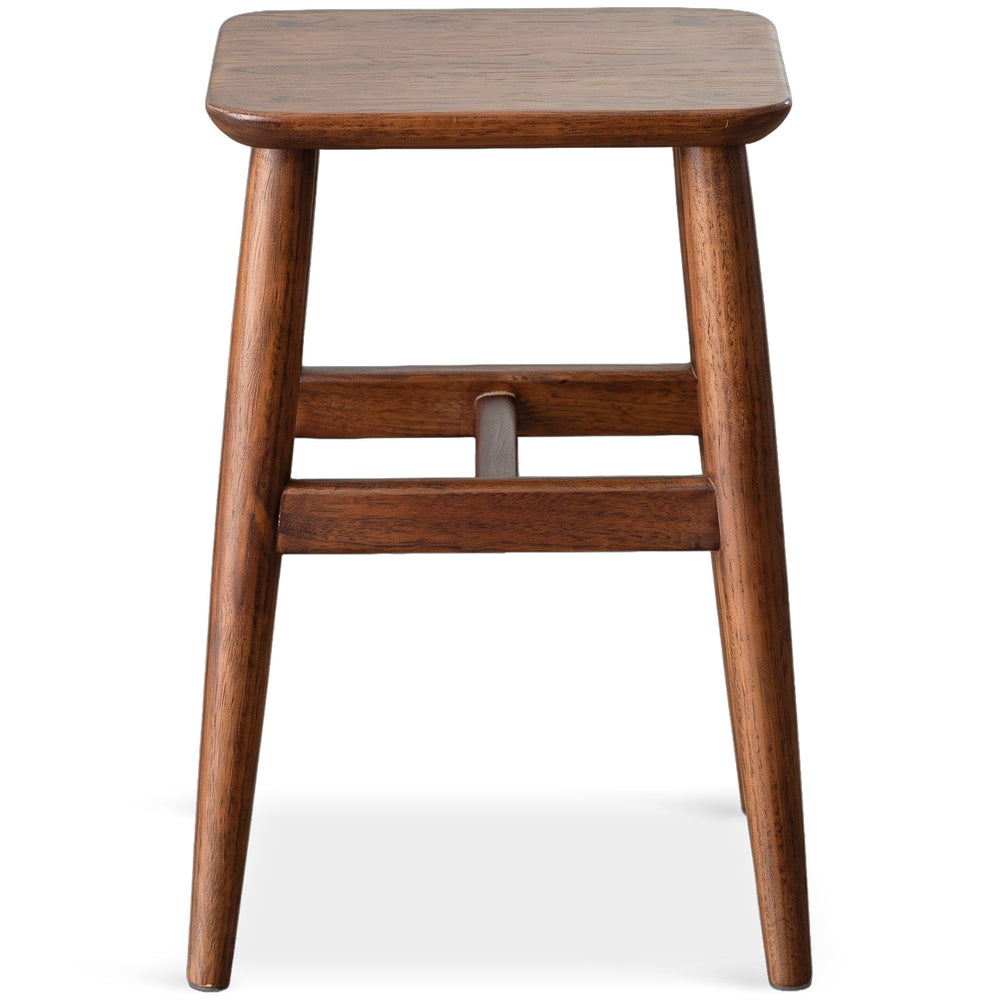 Vintage boxwood stool mellow in white background.