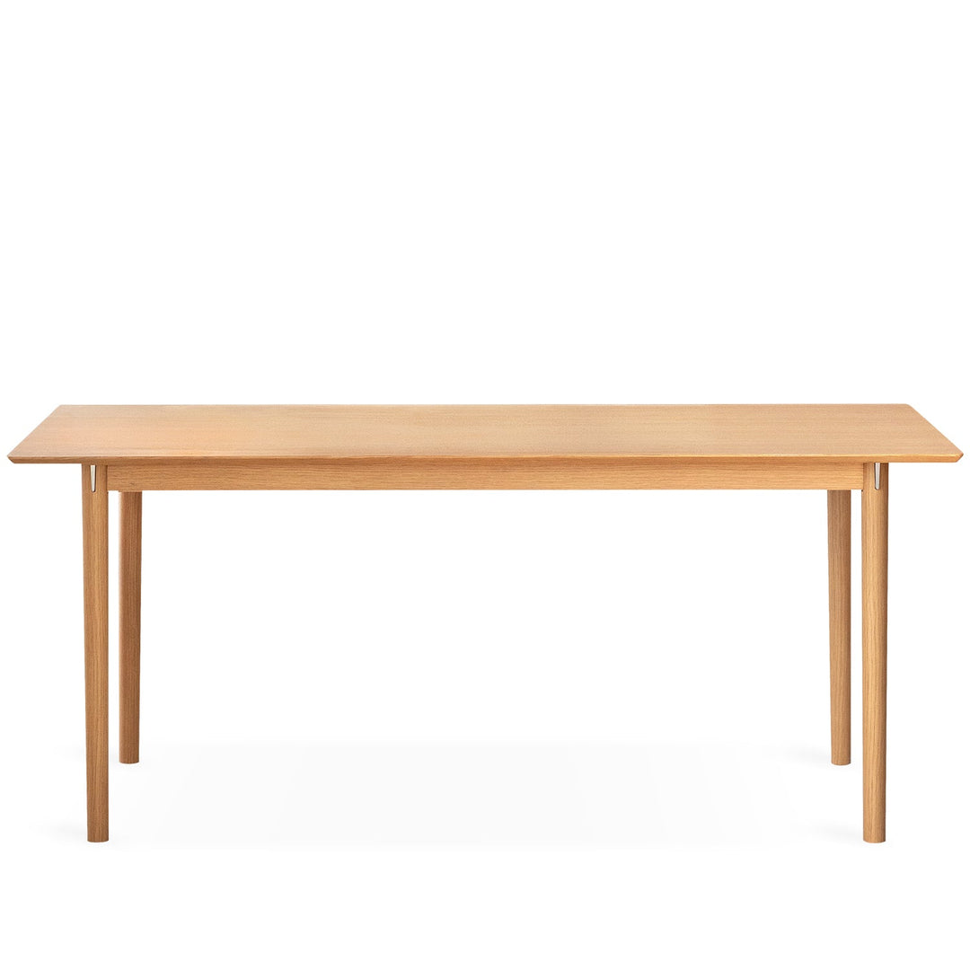 Minimalist ash wood dining table borel in white background.