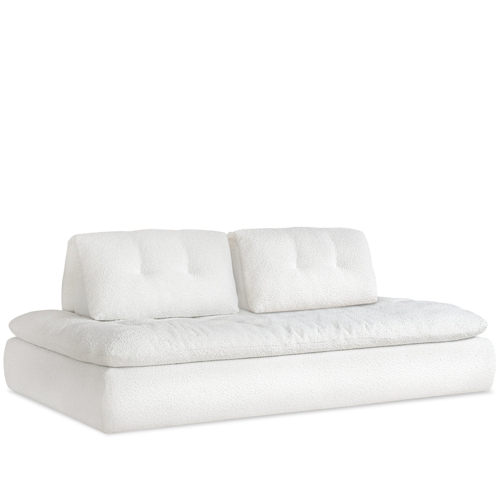 Cream boucle fabric modular 3 seater sofa couch bloc in white background.