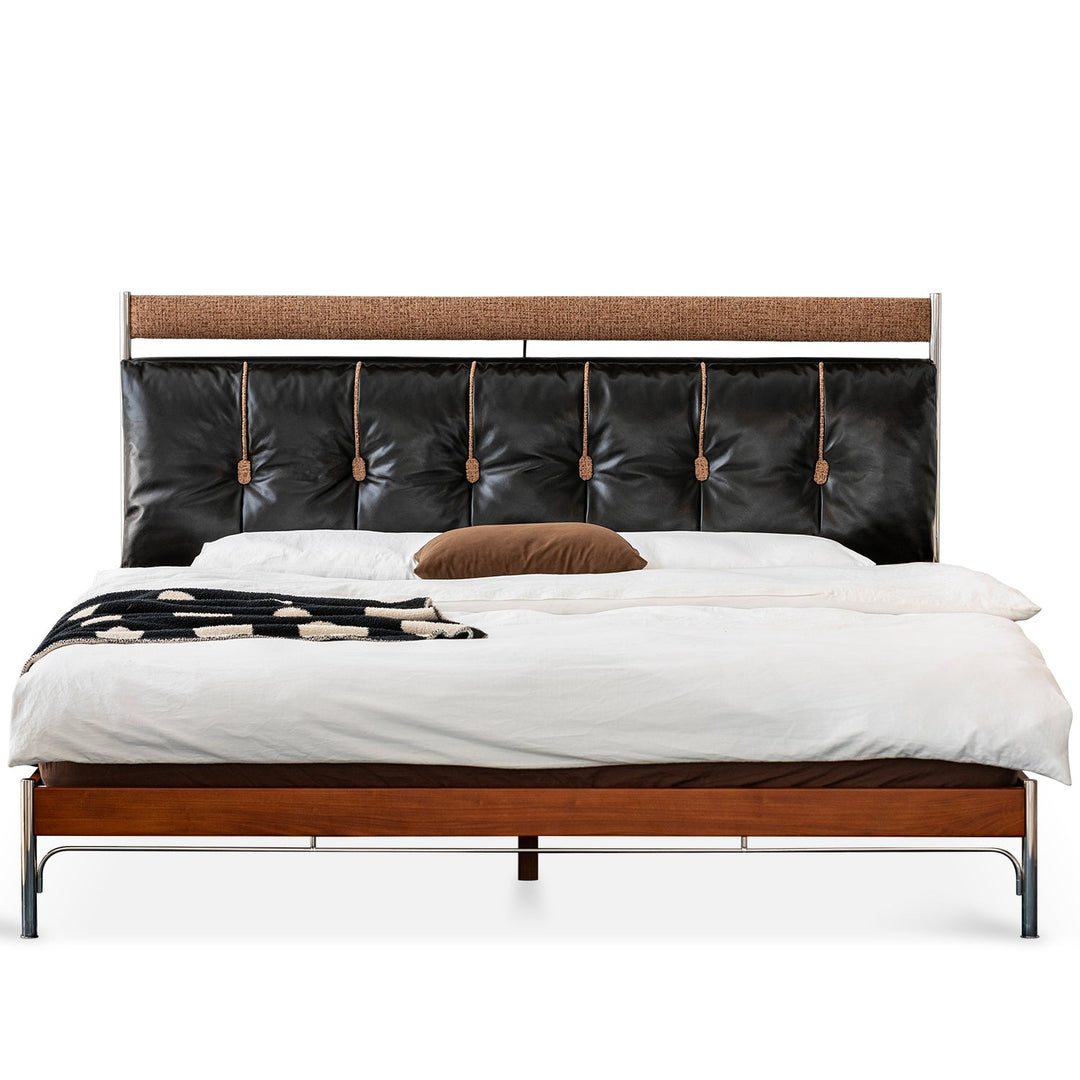 Bauhaus genuine leather bed supple black in white background.