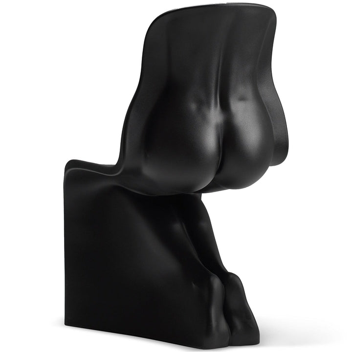 Bauhaus plastic dining chair her in real life style.