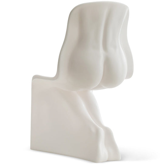 Bauhaus plastic dining chair her in white background.