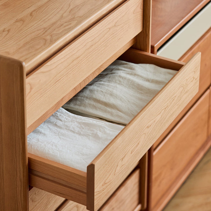 Scandinavian cherry wood chest of drawers vista in details.