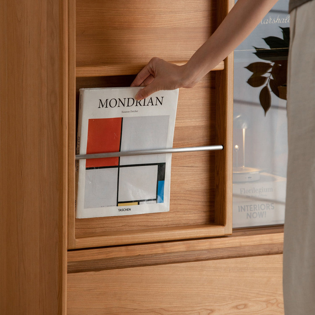 Scandinavian cherry wood side cabinet vista in close up details.