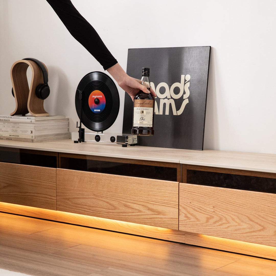 Scandinavian oak wood tv console floating light in panoramic view.