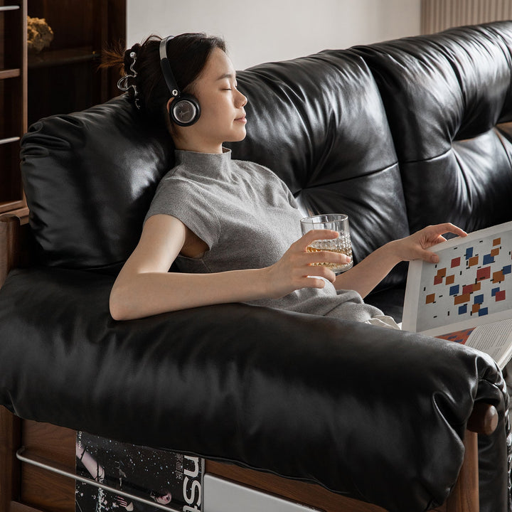 Scandinavian chenille velvet fabric walnut wood 3 seater sofa sofa open backed in close up details.