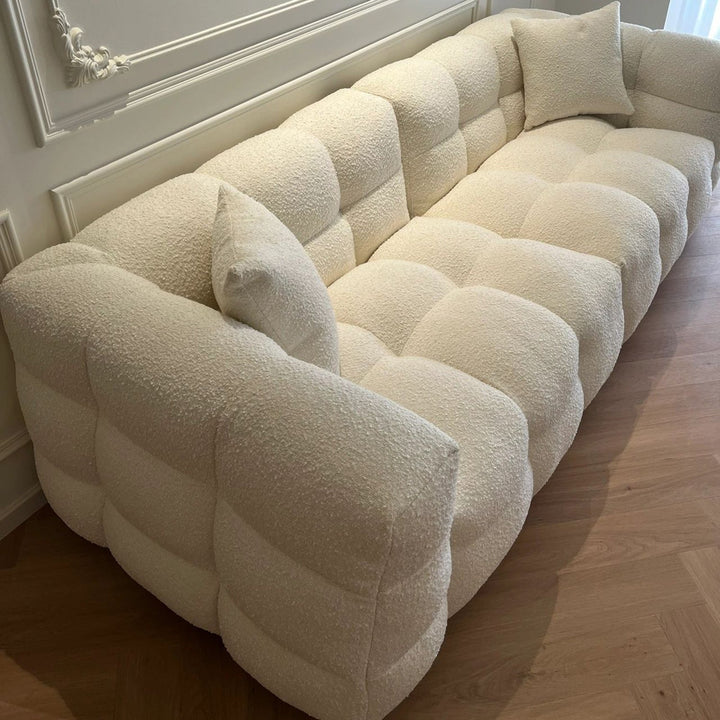 Cream boucle fabric 3 seater sofa boba in details.