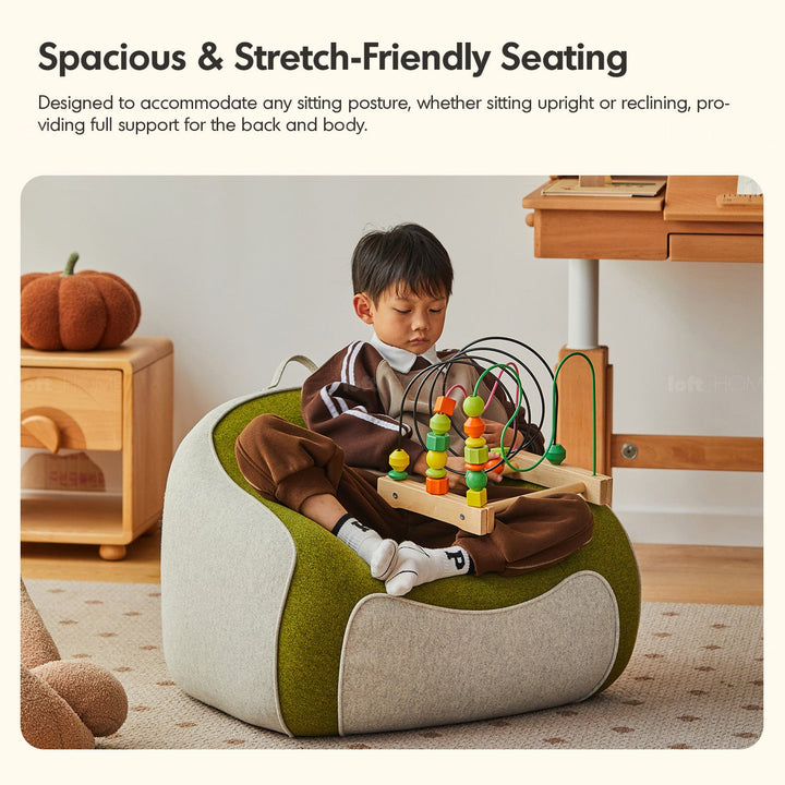 Bauhaus wool fabric kids 1 seater sofa avocado in real life style.
