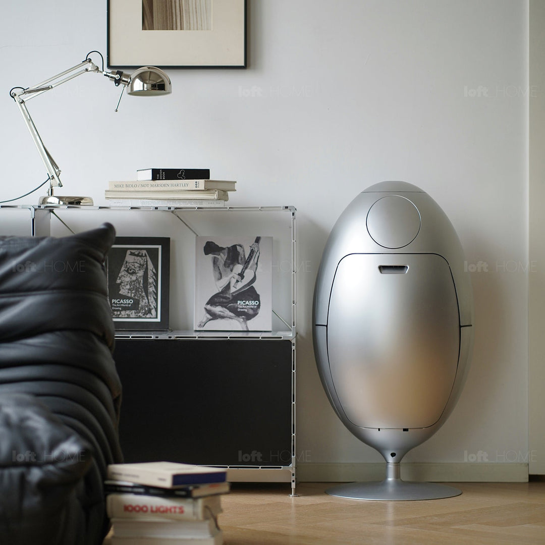 Contemporary abs waste bin egg with context.