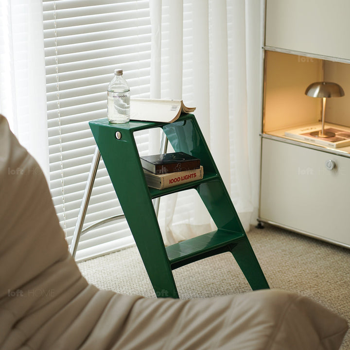 Contemporary plastic steel ladder alto in real life style.