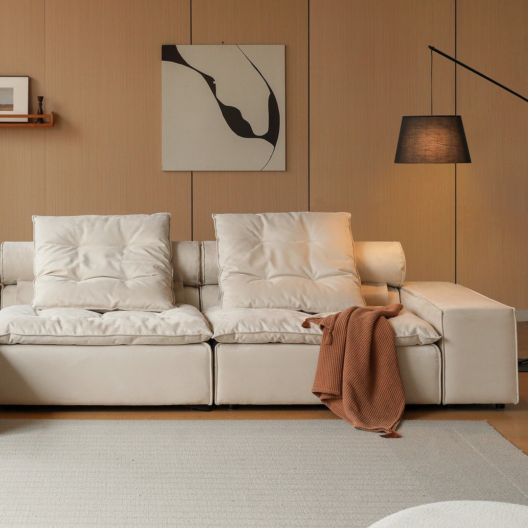 Contemporary suede fabric modular sectional 4 seater sofa bloom in panoramic view.